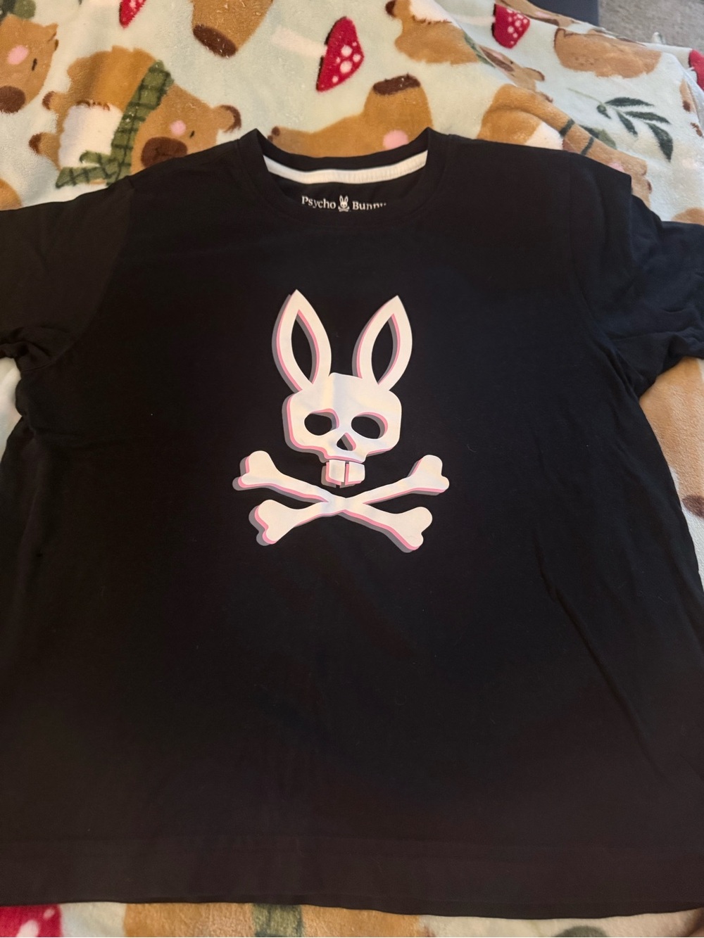 Psycho Bunny Black Tee with White and Pink Bunny Skull Graphic